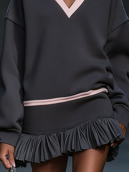 Gray Dress With Blush Accents And Pleated Hem