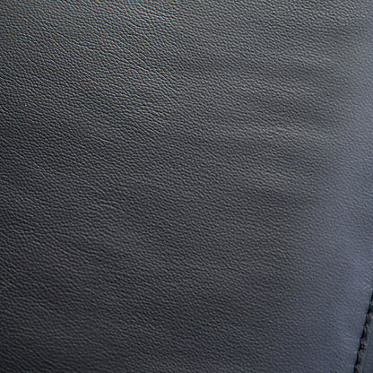 Furniture of America Marty Modern Leather Match Manual Reclining Sofa with Flared Padded Arms
