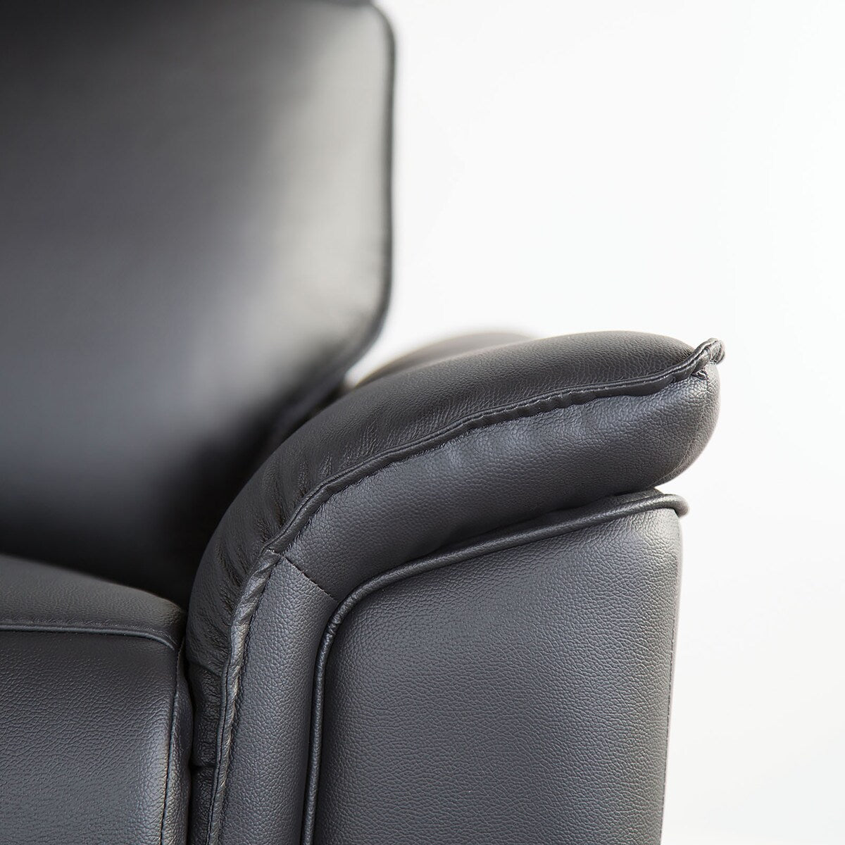 Furniture of America Marty Modern Leather Match Manual Reclining Sofa with Flared Padded Arms